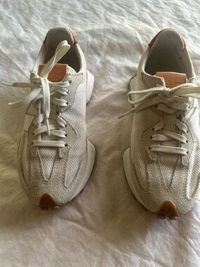 New Balance Kids Sneakers in Cream with Tan Accents.